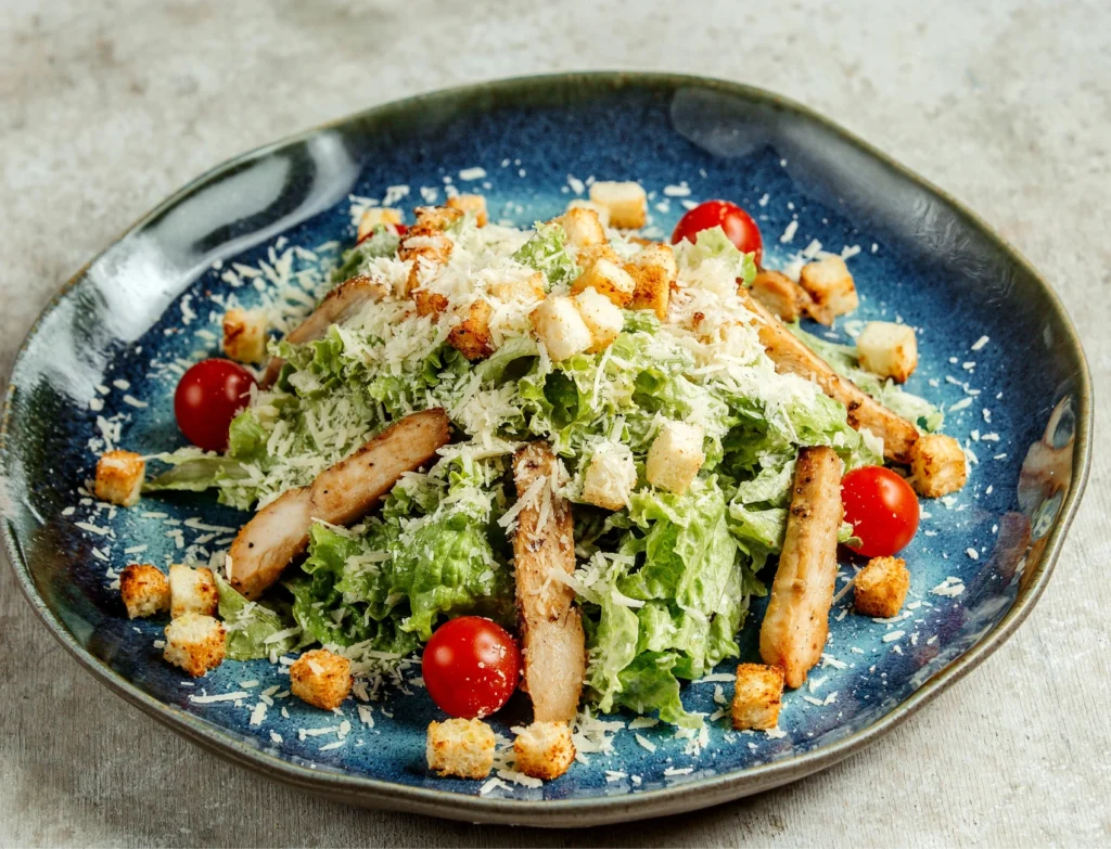 Grilled Chicken Caesar Salad Served